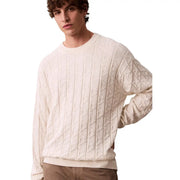 Cream-colored geometric cotton cable-knit sweater with textured diamond pattern and ribbed cuffs by calvin klein jeans