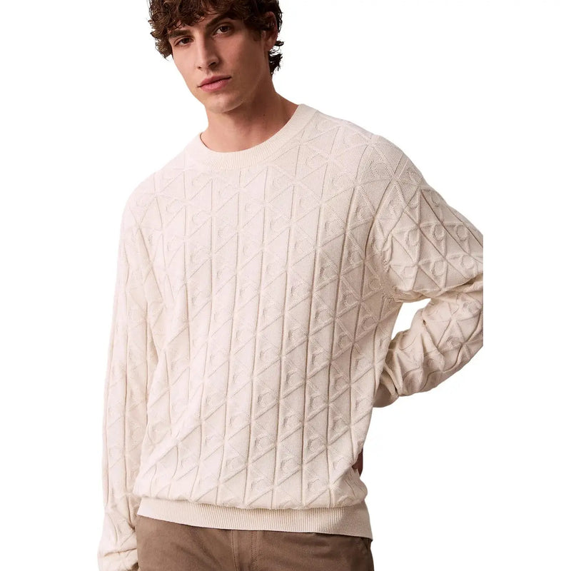 Cream-colored geometric cotton cable-knit sweater with textured diamond pattern and ribbed cuffs by calvin klein jeans