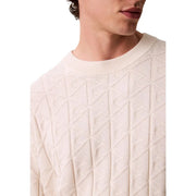 Cream-colored cotton knit sweater with geometric diamond pattern and ribbed neckline from Calvin Klein Jeans men collection
