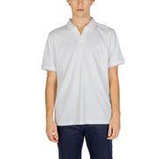 Calvin Klein Jeans men’s classic white polo shirt made of 100% cotton with subtle texture and Lacoste crocodile logo
