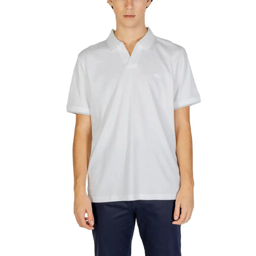 Calvin Klein Jeans men’s classic white polo shirt made of 100% cotton with subtle texture and Lacoste crocodile logo