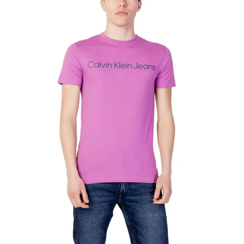 Calvin Klein Jeans men’s vibrant pink t-shirt with subtle navy blue logo across the chest for casual wear
