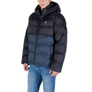 Calvin Klein Jeans puffer jacket for men in black and navy blue with quilted stitching and hood, front view