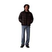 Calvin Klein Jeans puffer jacket for men in black with quilted design and subtle logo on left chest, front view