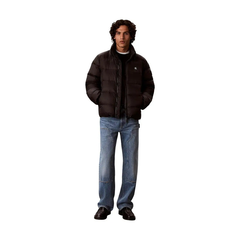Calvin Klein Jeans puffer jacket for men in black with quilted design and subtle logo on left chest, front view