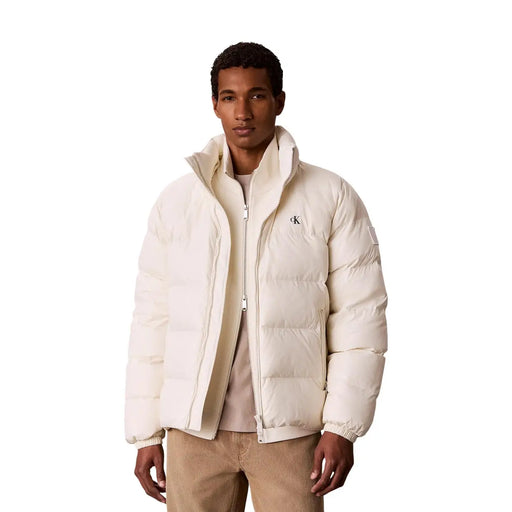Calvin Klein Jeans puffer jacket for women in cream with quilted design and black logo, front view