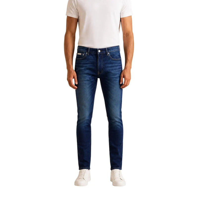 Calvin Klein Jean slim pour homme, bleu foncé, coutures classiques et délavage, vue de face
