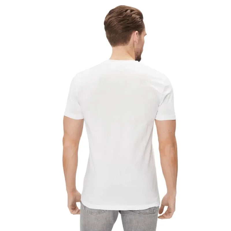 Man modeling Calvin Klein Jeans white cotton crew-neck short sleeve T-shirt