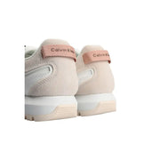 Beige suede and white rubber calvin klein jeans women sneakers with pink label on heel for spring summer use back view