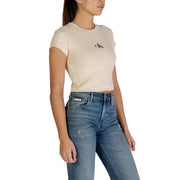 Cream-colored Calvin Klein cropped t-shirt with embroidered logo
