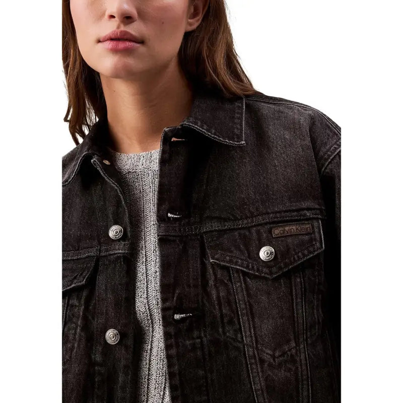 Calvin Klein jeans women black cotton denim jacket with silver buttons and brand patch on the chest pocket