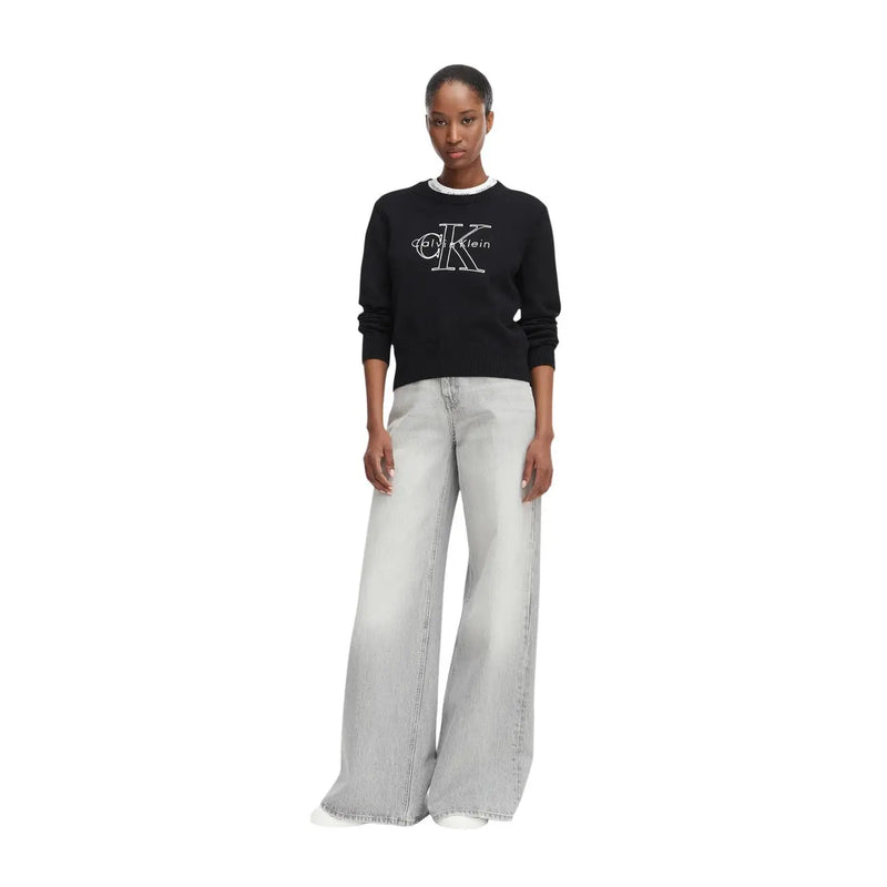 Black cotton knitwear jumper by Calvin Klein Jeans featuring a pearl-trimmed neckline and white embroidered logo