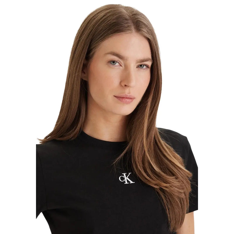 Black cotton Calvin Klein Jeans women round neck t shirt with white ck logo embroidered on left chest