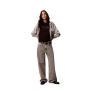 Wide-leg gray denim jeans with faded wash and subtle texture paired with calvin klein jeans women black cotton round neck t shirt