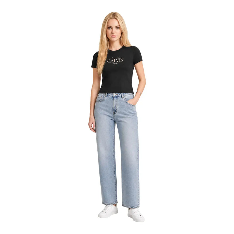 Black Calvin Klein Jeans women cotton short classic t shirt with white logo paired with light-wash denim jeans and white sneakers