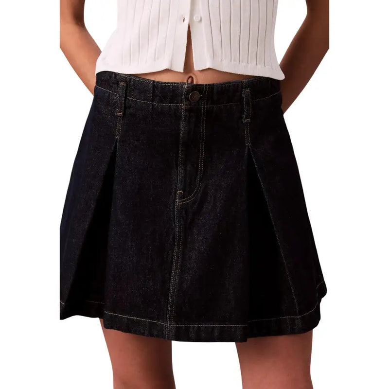 Calvin Klein Jeans women black cotton skirt featuring a high waist pleated denim design with button closure