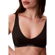Calvin Klein Jeans women black halter bralette with sleek minimalist design and subtle white branding on the band