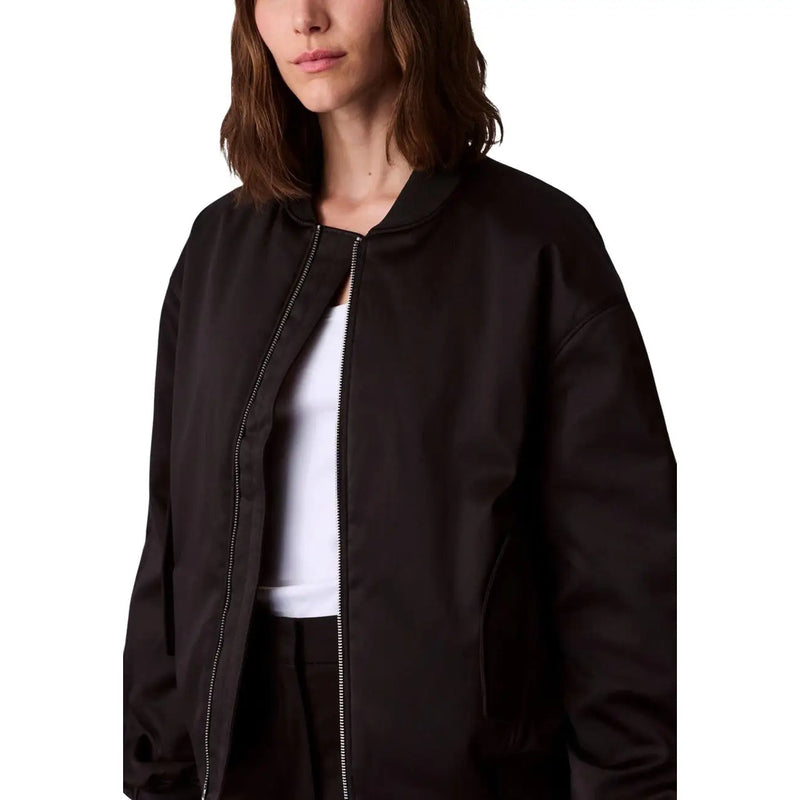 Calvin Klein Jeans women black polyester bomber jacket with sleek modern design and silver zipper accents