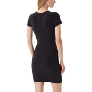 Woman wearing a Calvin Klein Jeans black short-sleeve mini dress with a fitted silhouette