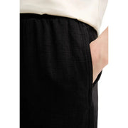 Calvin Klein Jeans women black linen trousers with relaxed fit elastic waistband fall winter style