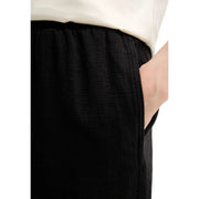 Calvin Klein Jeans women black linen trousers with relaxed fit elastic waistband fall winter style