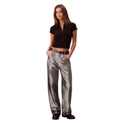 Calvin klein jeans women black viscose round neck t shirt paired with shiny metallic gray wide-leg modern pants