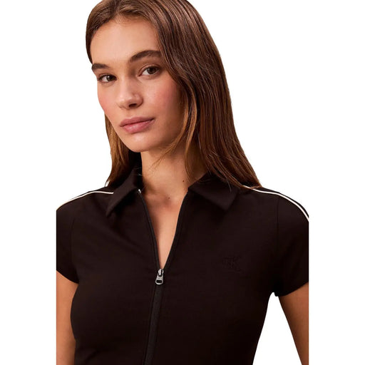 Calvin Klein Jeans women black viscose polo shirt with short sleeves white piping and front zipper closure