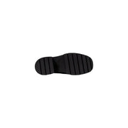 Calvin klein jeans women black wool slip on shoes showing black rubber sole with chunky ridged tread pattern