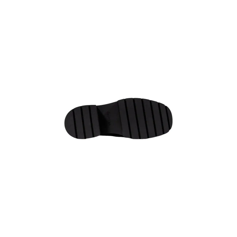 Calvin klein jeans women black wool slip on shoes showing black rubber sole with chunky ridged tread pattern