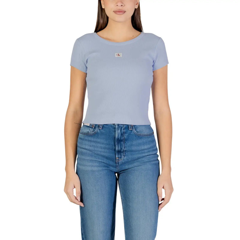 Light blue short-sleeved Calvin Klein jeans crop top with subtle logo patch made of cotton for women
