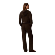Black calvin klein hoodie and matching pants set made of cotton for women in a casual style