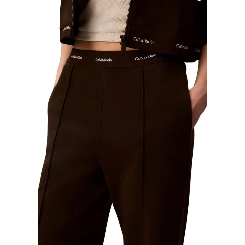 Calvin Klein Jeans women brown cotton trousers with a tailored fit and subtle white branding on the waistband