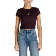 Calvin Klein Jeans women brown long sleeve cotton t-shirt with a dark burgundy cropped style and white logo on chest