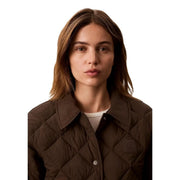 Brown quilted nylon jacket for women by Calvin Klein Jeans with classic collar and button closure