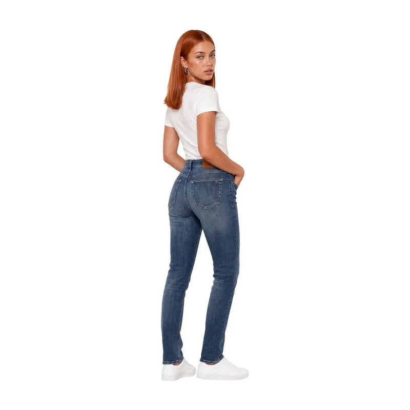 Calvin Klein jeans women cotton round neck t shirt white shown with high-waisted slim fit blue denim jeans back side