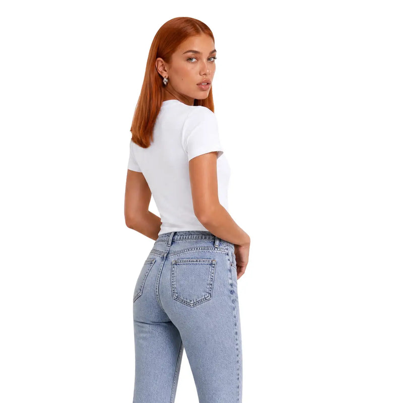 Light-wash denim jeans with classic five-pocket design and subtle thigh fading paired with calvin klein white cotton t-shirt