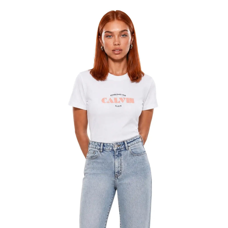 White calvin klein jeans women cotton short sleeve t shirt with peach logo and established 1969 text on front