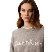 Calvin Klein Jeans women grey cotton knitwear sweater with soft fabric and bold white logo across the chest
