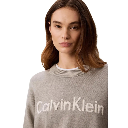 Calvin Klein Jeans women grey cotton knitwear sweater with soft fabric and bold white logo across the chest