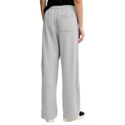 Back side of calvin klein jeans women grey cotton trousers featuring light gray loose fit sweatpants with elastic waistband and pocket