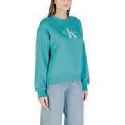 Teal calvin klein sweatshirt with white logo on chest for women light blue print long sleeve casual wear