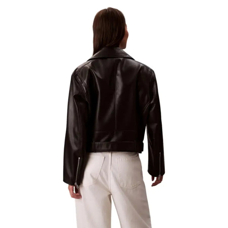 Dark brown leather jacket paired with white pants from Calvin Klein Jeans Women Long Black Zip Blazer collection