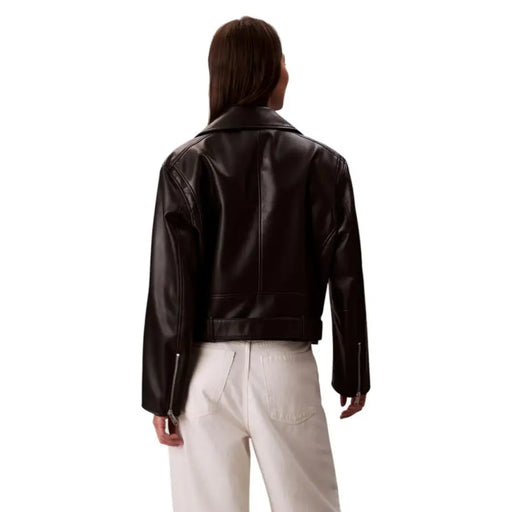 Dark brown leather jacket paired with white pants from Calvin Klein Jeans Women Long Black Zip Blazer collection