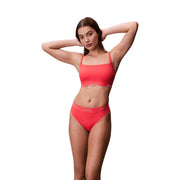 Vibrant coral Calvin Klein Jeans women orange bralette beachwear set with square neckline and high-waisted briefs