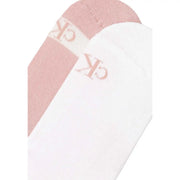A pair of soft minimalist white and blush pink Calvin Klein Jeans women sneaker socks with subtle ck logo embroidery