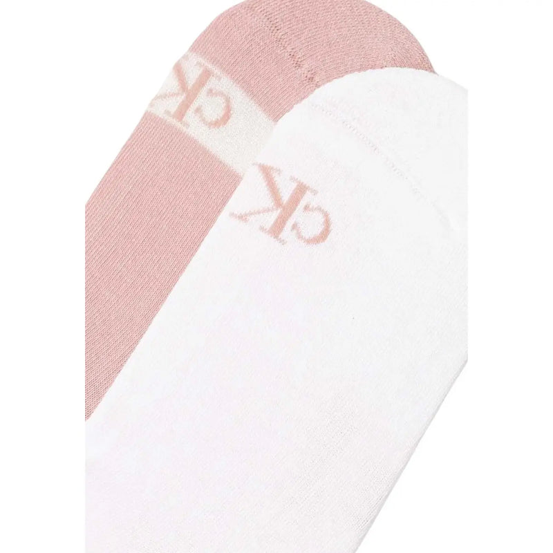 A pair of soft minimalist white and blush pink Calvin Klein Jeans women sneaker socks with subtle ck logo embroidery
