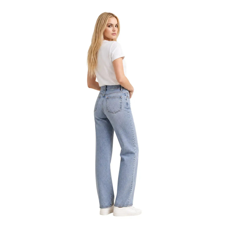 Light-wash high-rise straight-leg denim jeans paired with a Calvin Klein Jeans women white cotton classic short t shirt