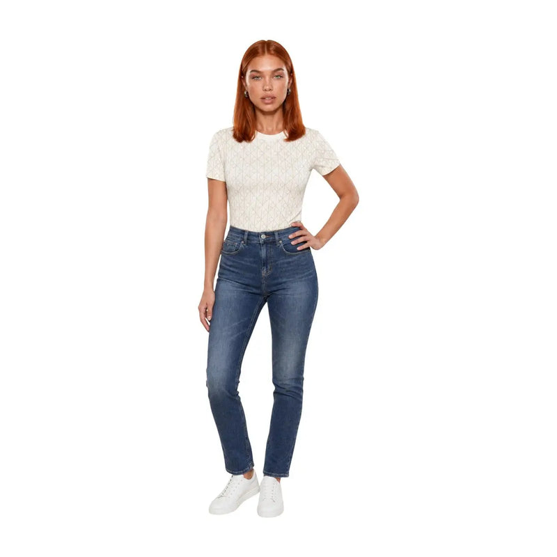 High-waisted blue denim jeans with a straight-leg cut paired with calvin klein jeans women white cotton geometric t shirt