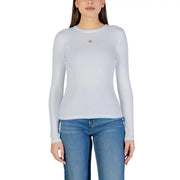 A light gray ribbed long-sleeve cotton top with a small red Calvin Klein logo on the chest for women