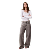 Wide-leg gray denim jeans with faded distressed finish and classic five-pocket design by calvin klein women